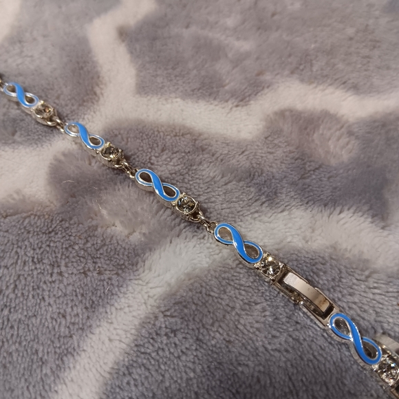 Blue enamel and crystal infinity bracelet. - Picture 13 of 14